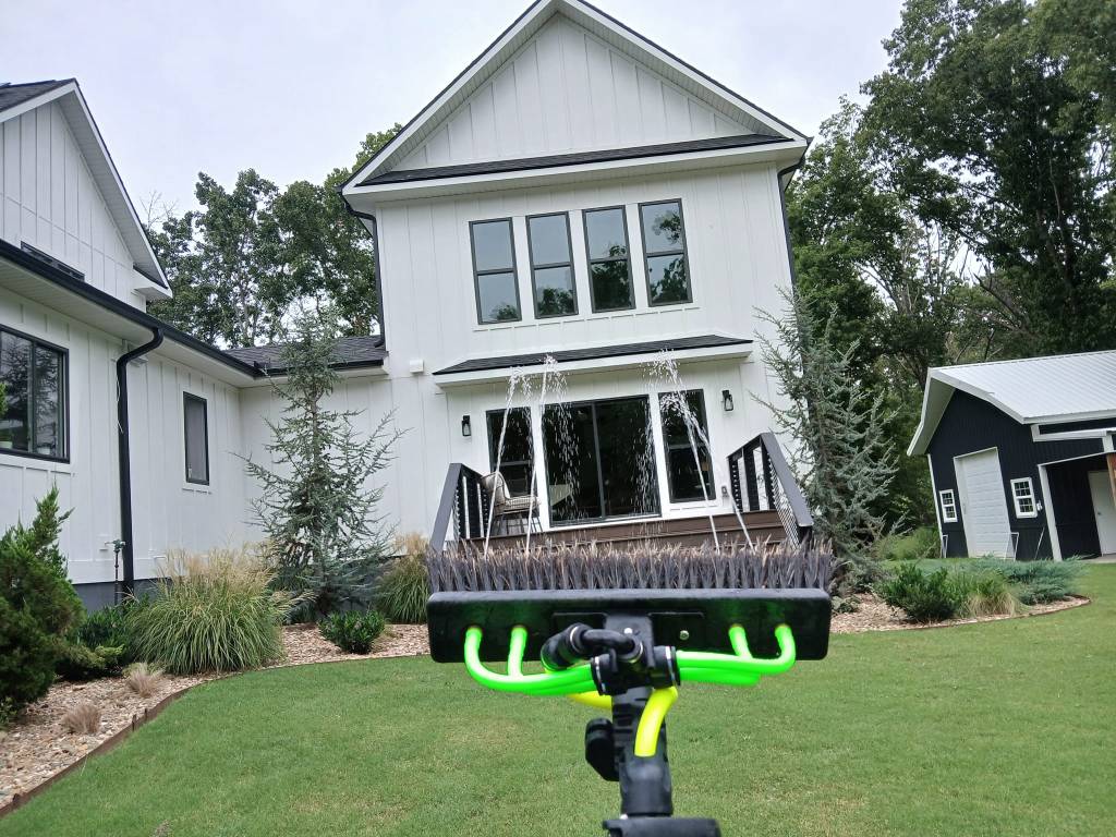 Window Cleaning using waterfed brush and zero TDS water. 
